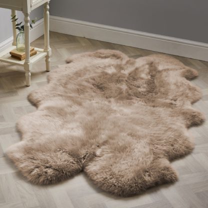 8c4a03b8488acaabcb7dd89733532f8bedb0849183c59fa5a280d6706c113ede.jpg An Image of Quad Sheepskin Rug Pink
