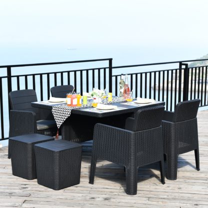 9420ff93c51ec273b49c97c9ef3c4c3f46e94dc518a4c52d01020156bcb455ae.jpg An Image of Faro 4 Seater Black Cube Dining Set Black