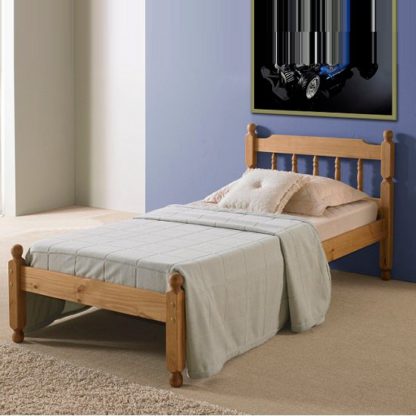 An Image of Coleton Spindle Wooden Single Bed In Waxed Pine
