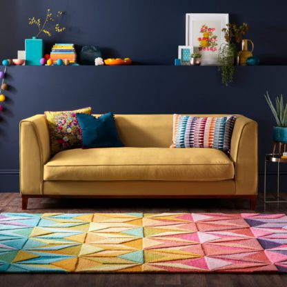 b0e0677e5ed9d7f5afb70bfbee1e580c5673c044a022b1fd86d0fb046b3fc2a0.jpg An Image of Reverie Rug Green, Red and Yellow
