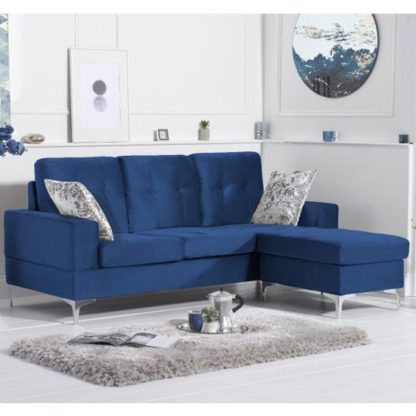 ccdc1ee608179178d31dbfd7d8d006437cdb355842111f1525c3b8b3bc11945c.jpg An Image of Wacox Velvet Reversible Chaise Corner Sofa In Blue