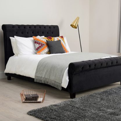 cf5f1d82f4e8b36139b0d2cb171cc05ae346694ab3790c17141ad05ef92a5fb6.jpg An Image of Orbit Black Velvet Upholstered Bed Frame Black