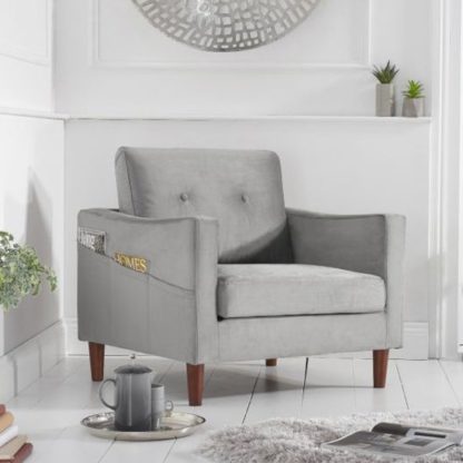 dfe16e697a645476dd6c247e0f1a460bd0e4aca5e1033d0cf01192b82c41b375.jpg An Image of Celaya Velvet Upholstered Armchair In Grey