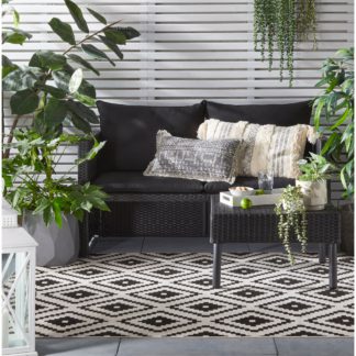 An Image of Geometric Monochrome Indoor Outdoor Rug Black and white