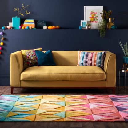 efd2ff12d29f4940f3871c22c5b462f96ffd08193fa35019788fc22c8fa3fffb.jpg An Image of Reverie Rug Green, Red and Yellow