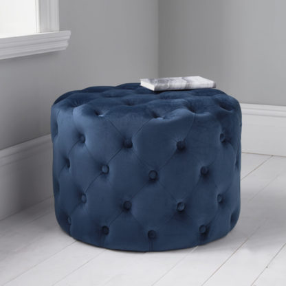 f4e87c7c2de9cbca894b0b86d715b409bc991b5aec2445e6e2c583f3455329fc.jpg An Image of Brea Round Tufted Velvet Pouffe In Mystique Blue