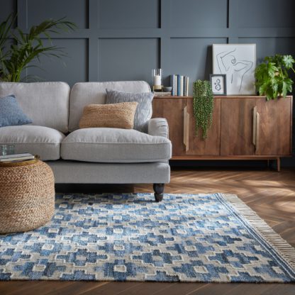 b210297f9e7f46342963d769e190f687b79912da19b6ef6de7c83ff66033712c.jpg An Image of Jonah Denim Mix Rug Denim Blue