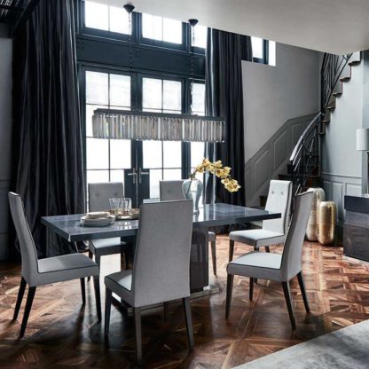 2732913324c104bd80b830946e9e0791f60a5c8e25fc814ff5d90a9f4facd9bf.jpg An Image of Borgia Extending Dining Table