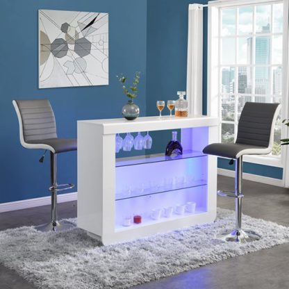 2fa928ef789f235340ec83d5cf1660f5b079901b904904281a38e4b682104780.jpg An Image of Fiesta White High Gloss Bar Table With 2 Ritz Grey White Stools