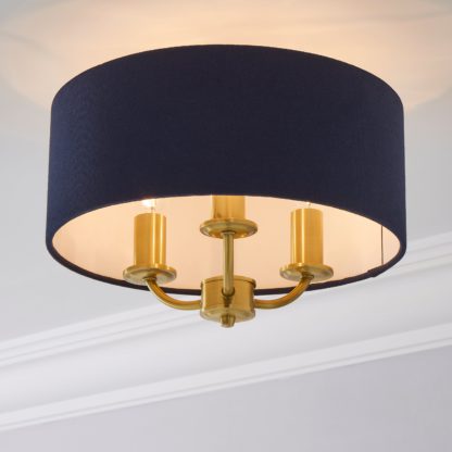 3a1d83ec1d70bb01bea0a5c3855ea99911aa90fd4cd1a68534f7e52e2be9f4bf.jpg An Image of Preston Anitque Brass Flush Ceiling Fitting Navy