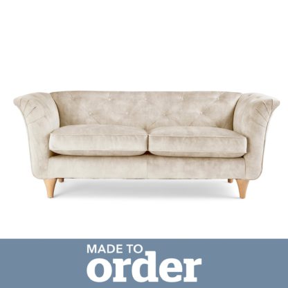 43da85b1833ed62ff83cab540a178bd4413a8f5d2fe8788fe325b2778068b721.jpg An Image of Jaipur 2 Seater Sofa Slub Velvet Slub Velvet Forest Green