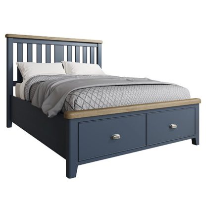 443df1e3095e3d4bac52aa940e1b2a8f5568e413f76a0a175c2c79796d03a489.jpg An Image of Hants Wooden King Size Bed With Drawers In Blue