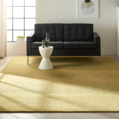 An Image of Calvin Klein Linear Glow Rug Green