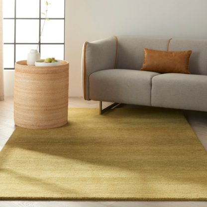 An Image of Calvin Klein Linear Glow Rug Green