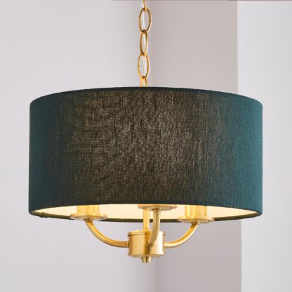 c1251ffc646f30263f69a2601f55daf07da5345f18d71208d2f47ada562dc8c6.jpg An Image of Preston Brass 3 Light Pendant Fitting Bottle (Green)