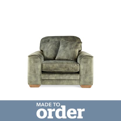 cec006410f4858a799a58bc4280288bf6b59d168108c47a5c78ac23f4276f4d2-1.jpg An Image of Morello Armchair Slub Velvet Slub Velvet Forest Green