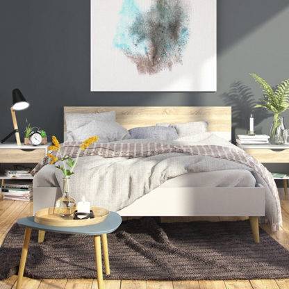 e6ee62b2baadba2c8207e1c8a26ae034dfa0c7efd3886a2fcf72573aab79f2b9.jpg An Image of Oklo Wooden King Size Bed In White And Oak