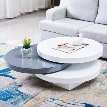 ec0a4583fb21428b66103b983c83cafe121d85c671ac6b37ac371c249ebba1b9.jpg An Image of Triplo Gloss Rotating Round Coffee Table In White And Grey