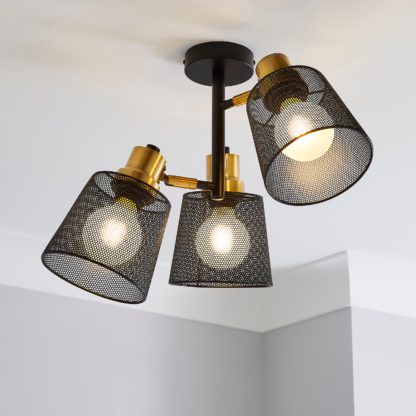 f99c20202c6918ca29574f6d5917555bf0bdfd96a61dcd4f4fad91408889e304.jpg An Image of Idris Industrial Ceiling Fitting Black