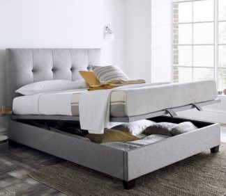 An Image of Walkworth Light Grey Fabric Ottoman Storage Bed Frame - 6ft Super King Size