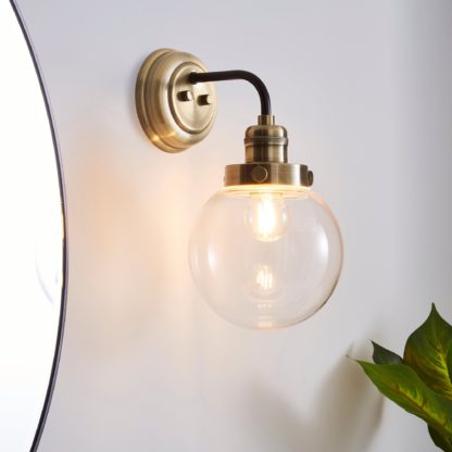 An Image of Broden Bathroom Wall Light Ant Brass Antique Brass