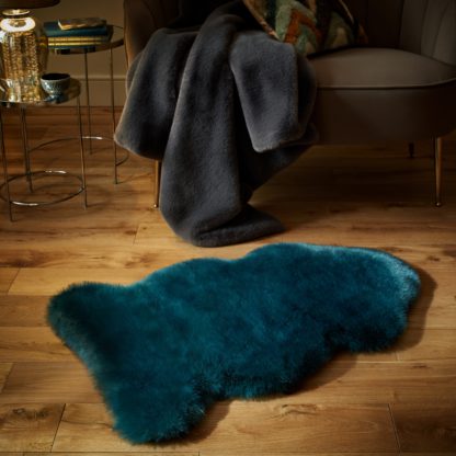 An Image of Luxury Faux Fur Pelt Rug Blush