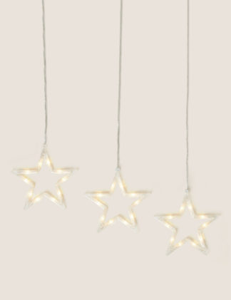 An Image of M&S Light Up Hanging Stars Curtain