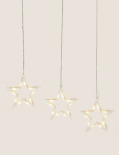 An Image of M&S Light Up Hanging Stars Curtain