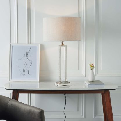 7ac6984b33fd4c5ed144441aa71138f2f232883c4db7758a21f72897b8da8e8f.jpg An Image of Vogue Nicoya Table Lamp Base Nickel