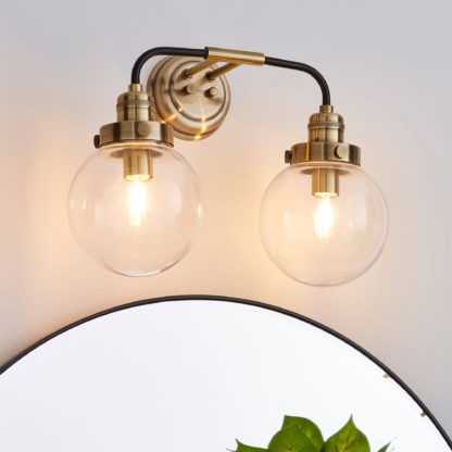 An Image of Broden Bathroom Wall Light Ant Brass Antique Brass