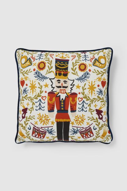 a18f678c1e9e40af01953d65dfb947983438e9983cf1170b8bcf6ad78baf8f2d.jpg An Image of Christmas Nutcracker Cushion
