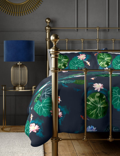 cda3b779225a96cf23f4464b18fdf15147325924fd102f75df24d9a1c274f1d8.jpg An Image of M&S Pure Cotton Waterlily Bedding Set