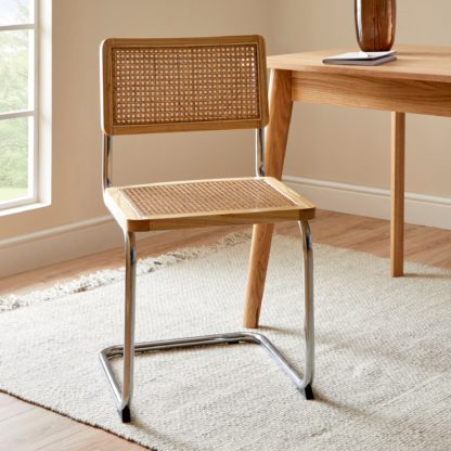 An Image of Naya Cane Canteliver Dining Chair Natural