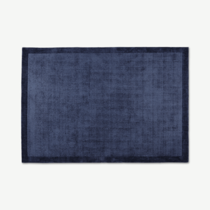 21b10a1febfdb98d847bcff1f20a1d4b08d93ae1dd046af944c664080ec54511-2.png An Image of Jago Border Rug, Extra Large 200 x 300cm, Ink Blue