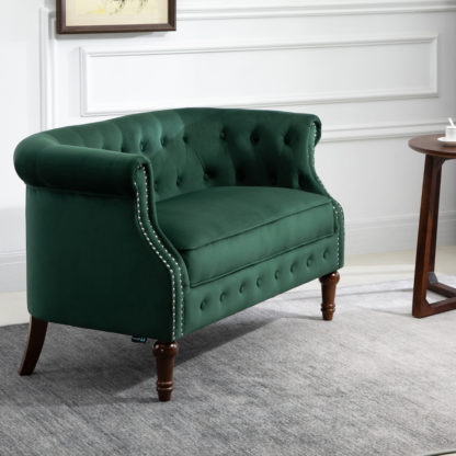 3e92b3a15c0a7f2a069395b69cf1891dc74ee68adc7987545ea58a9f0841bdd3.jpg An Image of Freya Green Fabric 2 Seater Sofa