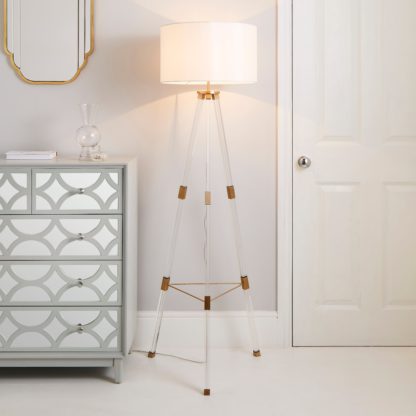 An Image of Hotel Finley Tripod Floor Lamp Gold
