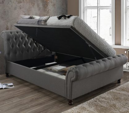 An Image of Castello Grey Fabric Ottoman Scroll Sleigh Bed - 5ft King Size