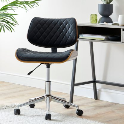 752958eac56ecfddf13ceaddce8fbd6956d2b3e449b6aafc45da85394cb184d4.jpg An Image of Remy Office Chair Tan