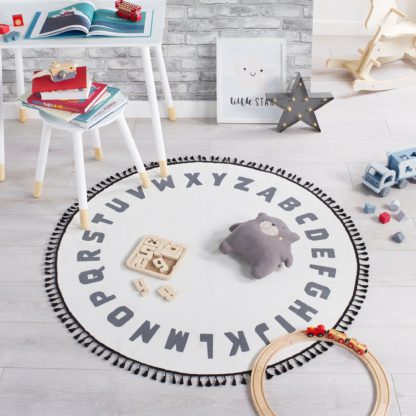 An Image of Alphabet Washable Circle Rug Black and white