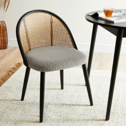b764b59918164c482b1afcdd8835c083a2eee54de3491914bb9b0b575ab92144-1.jpg An Image of Luella Cane Dining Chair Ivory