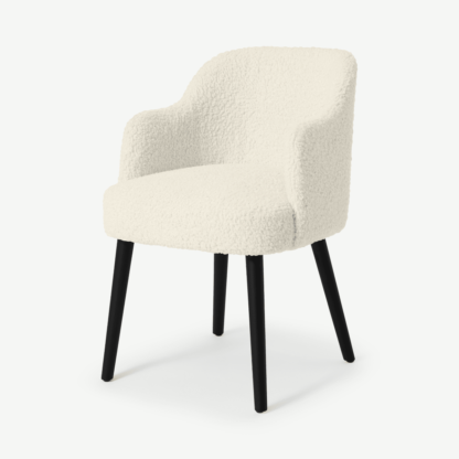 An Image of Swinton Carver Dining Chair, Faux Sheepskin with Black Legs