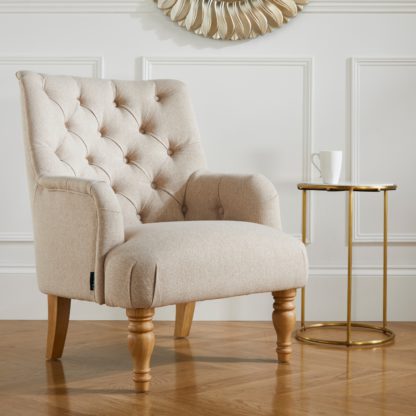 f09cdf2cae2a23ba652cdefd8fc1f8532f2147e58c37e12e9a6f1190213d7922.jpg An Image of Padstow Wheat Fabric Armchair