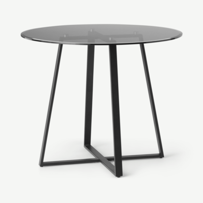 fd8ebd38330f5770de823dd9d4f88060dd06cca5f46d340b63a9a9778aa48b83-1.png An Image of Haku 2 Seat Round Dining Table, Black