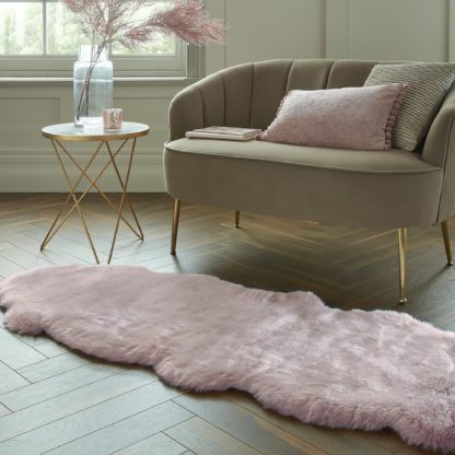 09f90f004bcda6a8a8f2cbd8ed2d98c0b066ccaeb5a2859e71c460d67e4c71da.jpg An Image of Copenhagen Double Pelt Faux Fur Rug Copenhagen Blush Pink