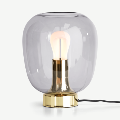 1598e6fbfa7daa48421e7ab92a4d3247adb5c99f6c0a171491813230cf0aa2a3.png An Image of Temple Table Lamp and 002 Plumen LED Bulb, Brass