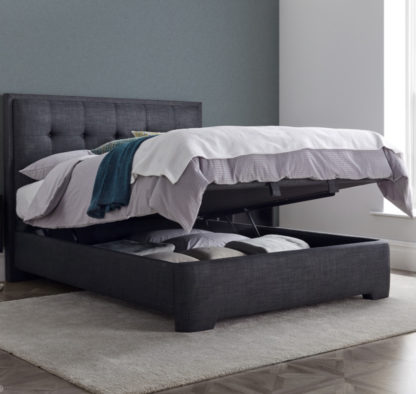 1810373bb3c6c4fadf72f0ad9dbaacc21134b37f8f13de4f6b69f9219ca5af65-1.jpg An Image of Falstone Slate Grey Fabric Ottoman Storage Bed Frame - 6ft Super King Size