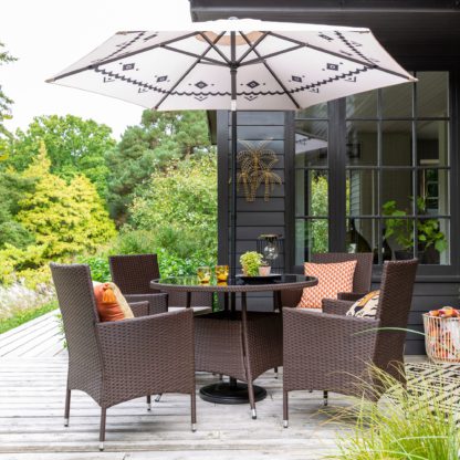 4aa37c245416a88a63cc6ec98399e4aab1b574590eb4682e2a54e3a048076d9a.jpg An Image of St Lucia 4 Seater Brown Round Dining Set Brown
