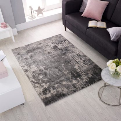 688a087b1036138cee3c530c0996b6faa4a2ce479e6cca1fc3e2c5b6147c09f1-1.jpg An Image of Wonderlust Rug Grey