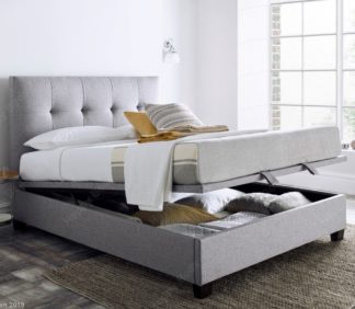 An Image of Walkworth Light Grey Fabric Ottoman Storage Bed Frame - 4ft6 Double