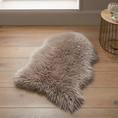 80eb18e18cc41b950b9c9b328022577c24f2fb450c8bd27c03ead3b69784e541.jpg An Image of Luxe Single Pelt Faux Sheepskin Rug Luxe Natural